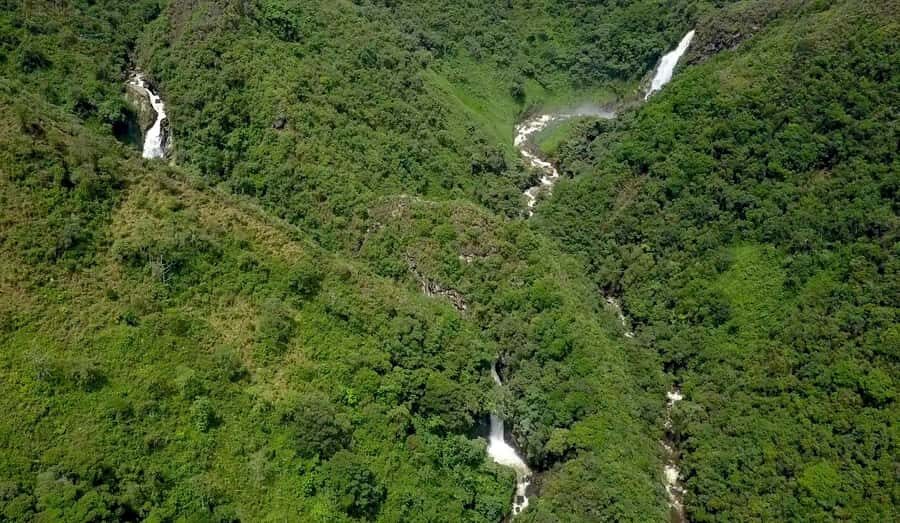 From Medellin: Epic Zipline and Giant Waterfall - Standing at the 100-meter waterfall: spray, power, and the Lenard effect