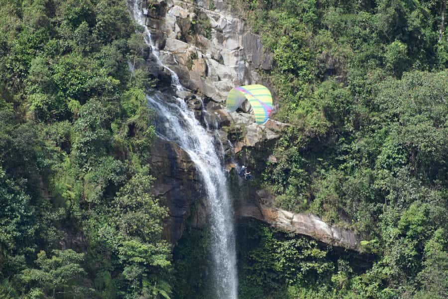 From Medellín: Paragliding and Rafting Combo Tour - Lunch stop and the waiting game when weather changes