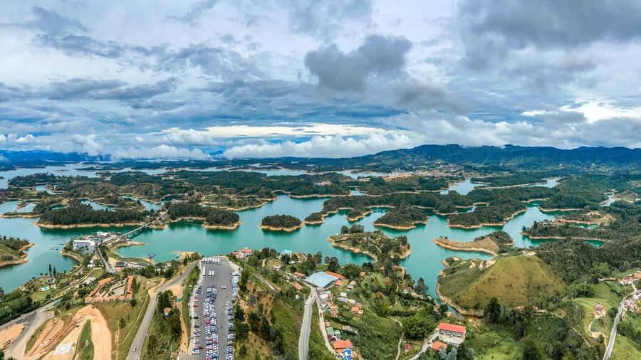 From Medellín: Paragliding Flight and Guatape Tour - What to bring (and why passport photos matter)