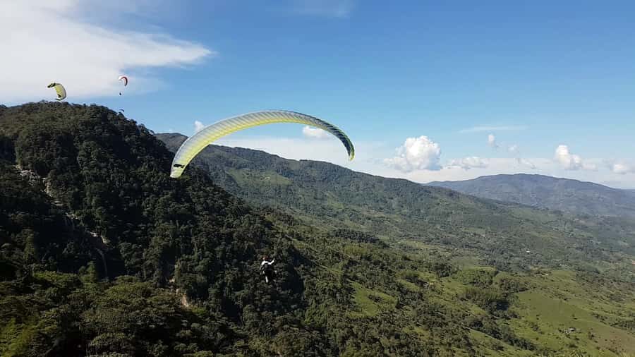 From Medellin: Private Paragliding Tour Over Waterfalls - Why this Cocorná waterfalls flight feels like real Medellín country