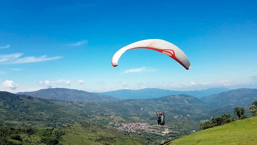 From Medellin: Private Paragliding Tour Over Waterfalls - Guides, language, and what private group time really adds