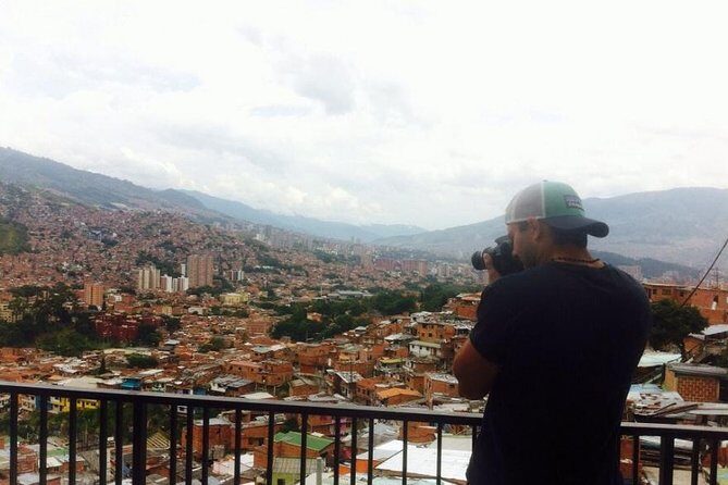 Full Day Private Medellin City, Street Art and Food Tour - San Javier street art walk: stories behind the murals