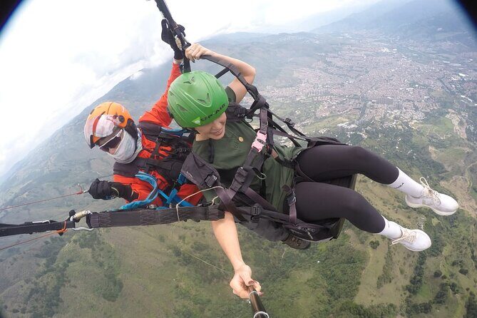 Go Paragliding in Medellín with private transporter service - GoPro photos and video same day: The memory grab you’ll care about