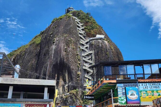 Guatapé and Peñol Private Full Day Tour from Medellín - Peñol town pass: Phoenix sculpture and tomato park views