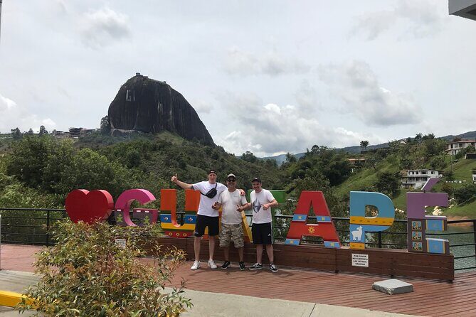 Guatape Full Day with Waterfalls - Guatapé Dam waterfalls: a short scenic stop with built-in time for photos