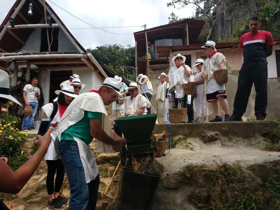 Medellín: Guatape Village with Coffee and Fruit Tasting Tour - El Peñol replica and the dam story: a place shaped by water