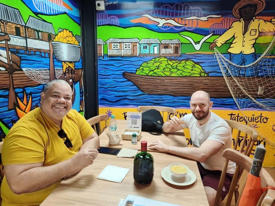 Medellín: Street Food Tour with Local Tastings - Meeting Point at Parque El Poblado: orange umbrellas and a fast start