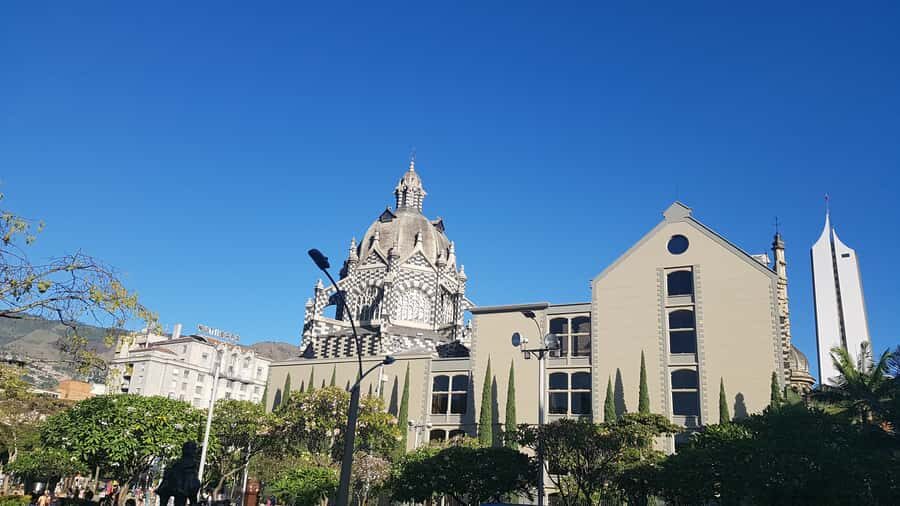 Medellín: Walking Tour with Cable Car and Botero Plaza - Santo Domingo Savio Library: Modern Landmark, Real Neighborhood