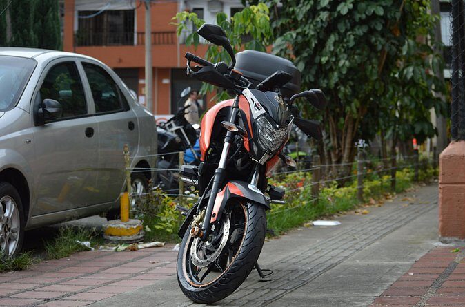 Motorcycle rental in Medellin with unlimited km - Helmet Setup, SOAT Insurance, and Night Riding Rules