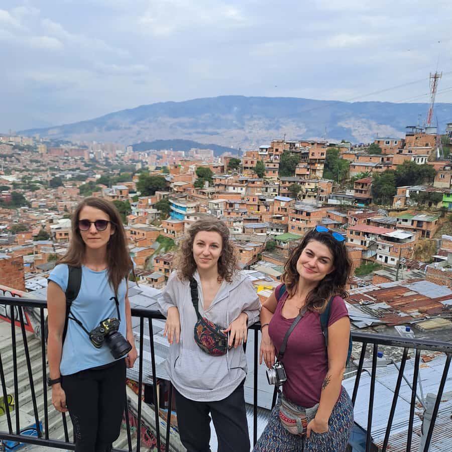 Shared Tour to Comuna 13 & Aurora Cable Car in Medellin - Comuna 13 walking route: murals, alleys, and the meaning behind the walls