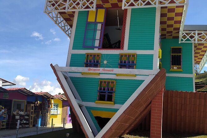 Tours Guatape Day of Adventure and Fun - El Alto del Chocho: llama farm + bottle-feeding fish + crafts