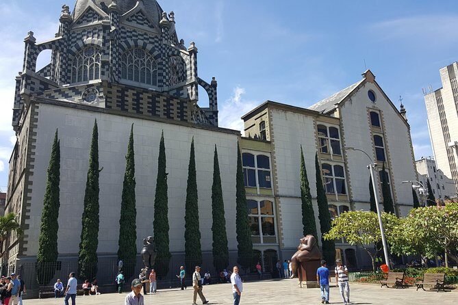 Walking tour downtown Medellín - Plaza Cisneros: Light Square and Early Skyline Views