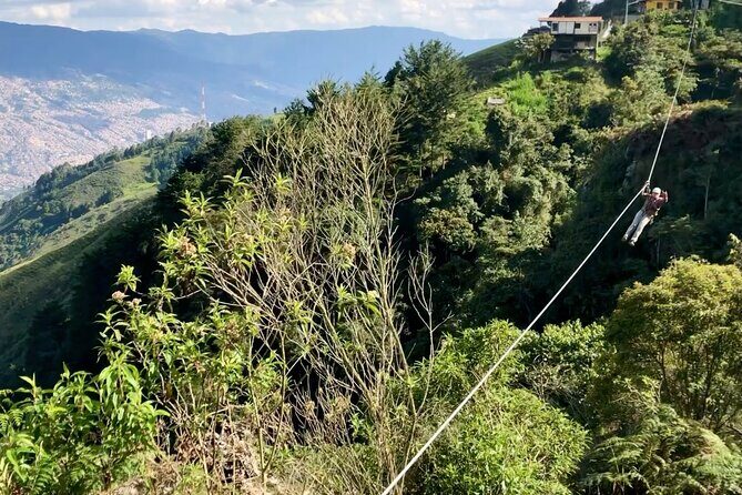 Zip-Line and Waterfall Climb Adventure - Your Photo Moment: Suspension Bridge, Then a Descent for a Great Canyon Shot